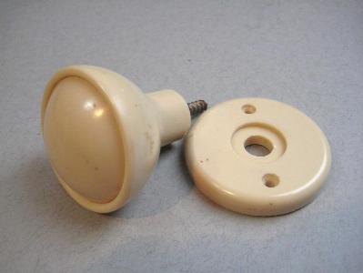 Ivory colour door knob on rose -  select me for a larger image